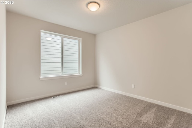 empty room with carpet floors