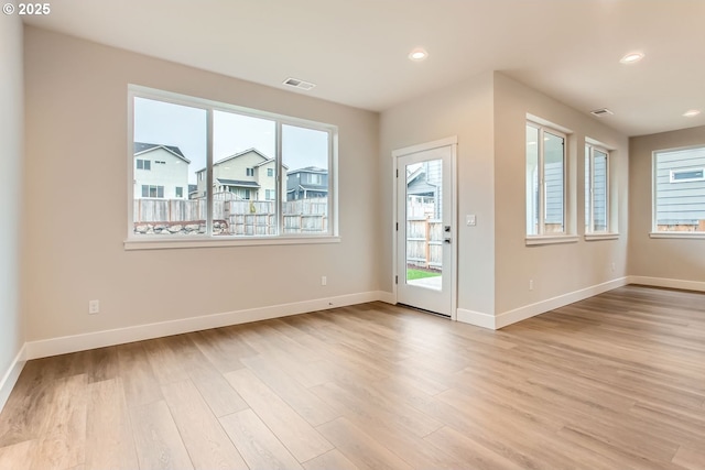 doorway with light hardwood / wood-style floors