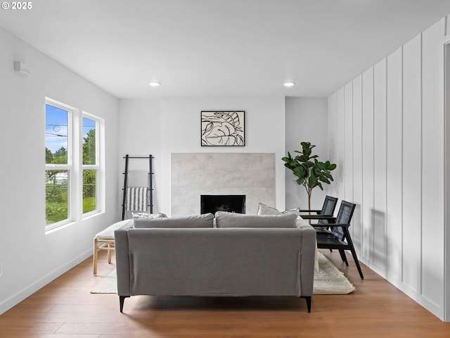 3401 SE 129th Ave, Portland, OR 97236 - living area featuring a tile fireplace, wood finished floors, and recessed lighting