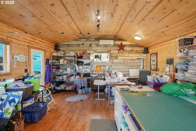 interior space featuring wooden ceiling, hardwood / wood-style floors, vaulted ceiling, and wooden walls