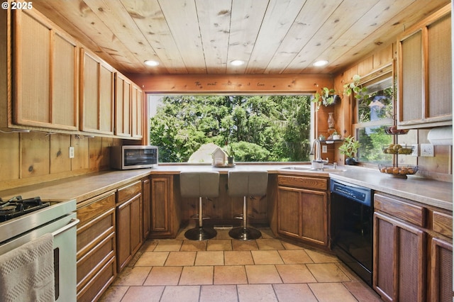 33712 Rainbows End Ln, Warrenton, OR 97146 - kitchen with stainless steel appliances, a sink, recessed lighting, light countertops, and wood ceiling