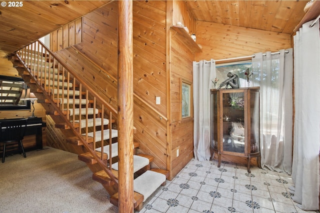 33712 Rainbows End Ln, Warrenton, OR 97146 - stairs featuring wooden ceiling, wooden walls, and lofted ceiling