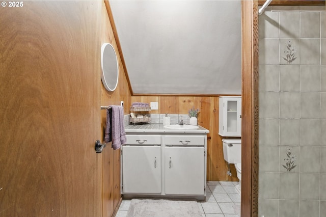 33712 Rainbows End Ln, Warrenton, OR 97146 - full bath with toilet, vanity, tile patterned flooring, a shower, and lofted ceiling