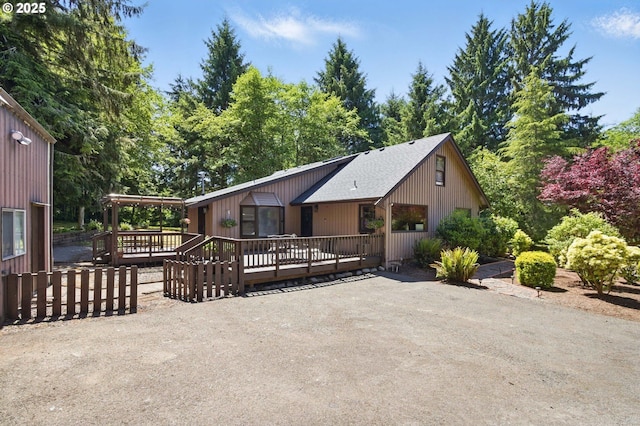33712 Rainbows End Ln, Warrenton, OR 97146 - rustic home with a wooden deck