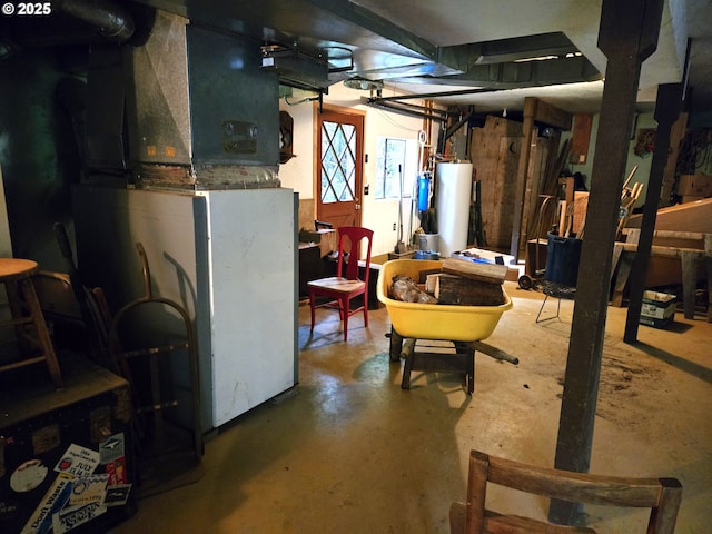 basement featuring heating unit and gas water heater