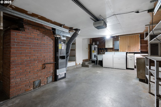 garage with heating unit, a garage door opener, independent washer and dryer, and electric water heater