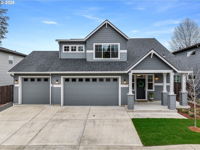 view of front of house featuring driveway, a shingled roof, an attached garage, and fence