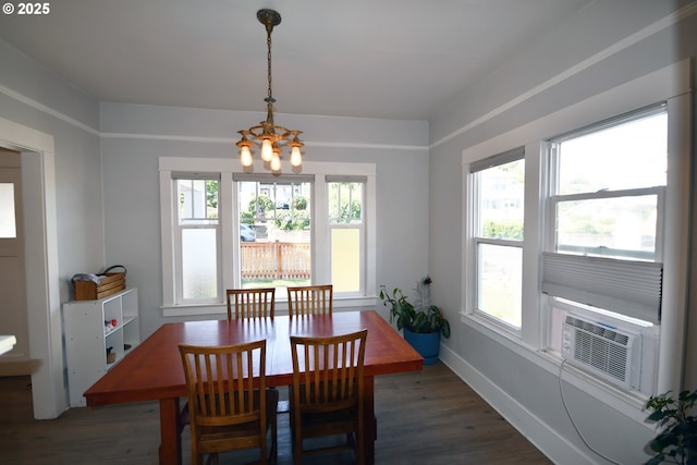 609 E 10th St, The Dalles, OR 97058 - dining room with a chandelier, wood finished floors, baseboards, and cooling unit