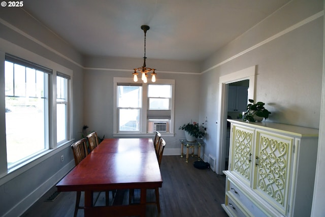 609 E 10th St, The Dalles, OR 97058 - dining room with a chandelier, healthy amount of natural light, dark wood-style flooring, and cooling unit