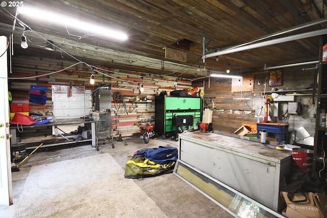 609 E 10th St, The Dalles, OR 97058 - garage with a workshop area and wooden walls