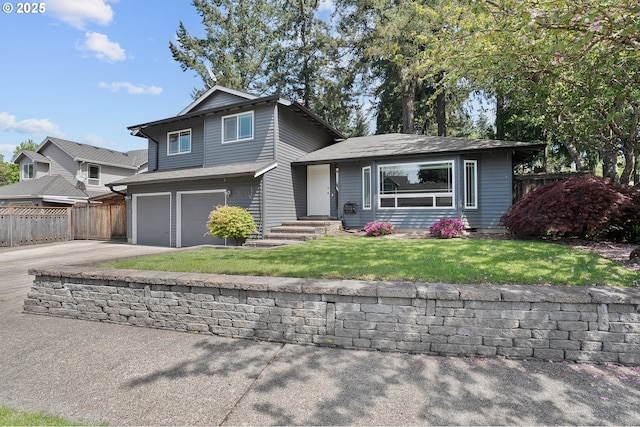 20752 SW 104th Ave, Tualatin, OR 97062 - split level home featuring an attached garage and concrete driveway
