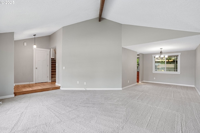 20752 SW 104th Ave, Tualatin, OR 97062 - unfurnished living room with a chandelier, light colored carpet, high vaulted ceiling, stairway, and beam ceiling