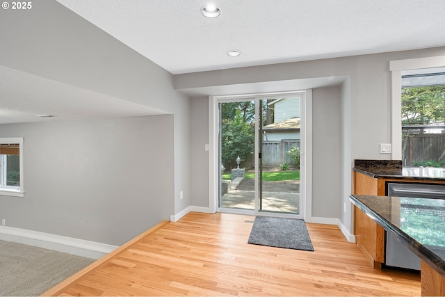 20752 SW 104th Ave, Tualatin, OR 97062 - entryway featuring plenty of natural light, light wood-type flooring, recessed lighting, and a textured ceiling