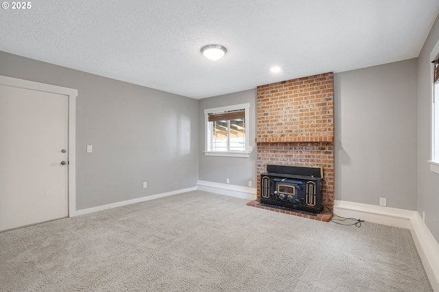 20752 SW 104th Ave, Tualatin, OR 97062 - unfurnished living room featuring carpet and a textured ceiling