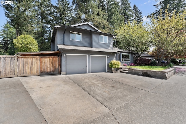 20752 SW 104th Ave, Tualatin, OR 97062 - view of front facade with driveway and an attached garage