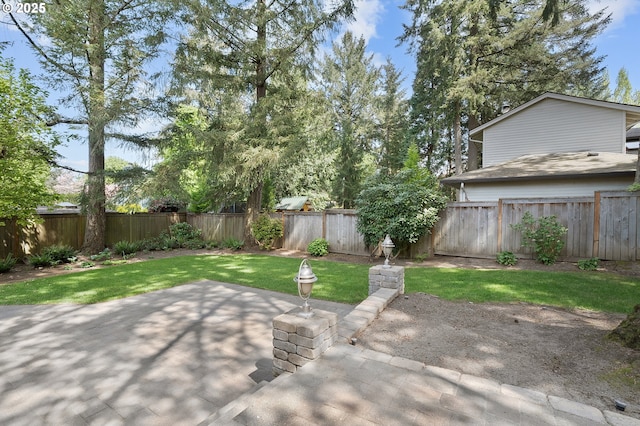 20752 SW 104th Ave, Tualatin, OR 97062 - fenced backyard with a patio area