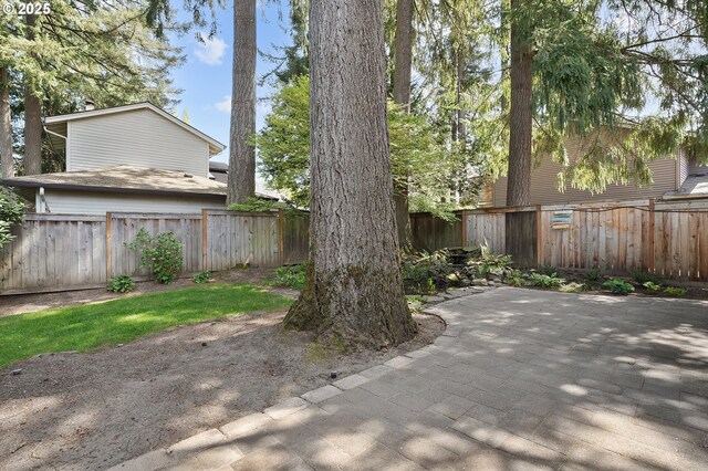 20752 SW 104th Ave, Tualatin, OR 97062 - fenced backyard with a patio