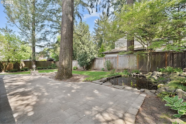 20752 SW 104th Ave, Tualatin, OR 97062 - fenced backyard featuring a patio