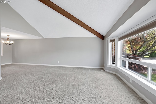 20752 SW 104th Ave, Tualatin, OR 97062 - unfurnished living room featuring a chandelier, carpet floors, and plenty of natural light