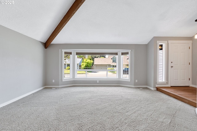 20752 SW 104th Ave, Tualatin, OR 97062 - unfurnished living room with carpet flooring and a textured ceiling