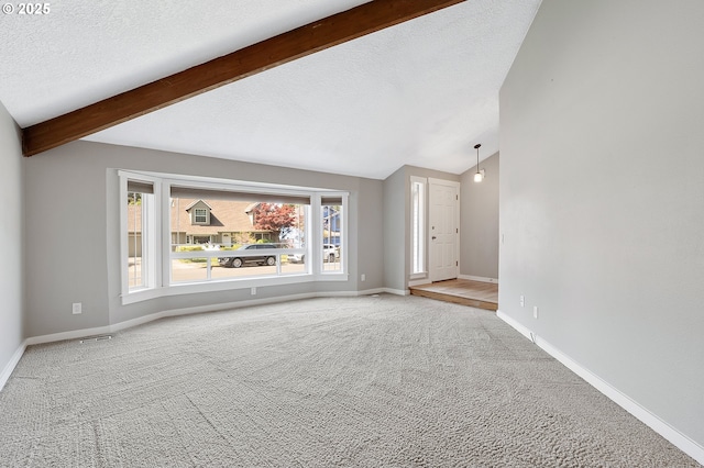 20752 SW 104th Ave, Tualatin, OR 97062 - unfurnished living room with carpet flooring and a textured ceiling