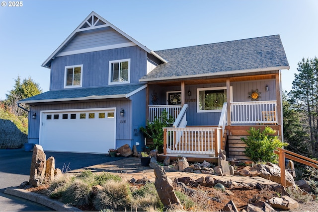 view of front facade featuring a garage and a porch