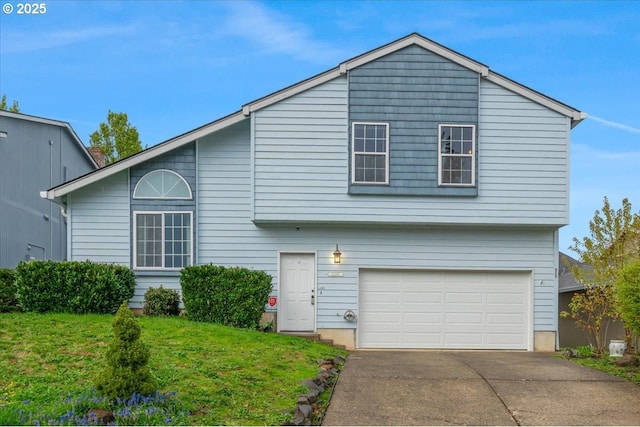 11347 SE Abby Ln, Clackamas, OR 97015 - view of front of property featuring a garage, concrete driveway, and a front lawn