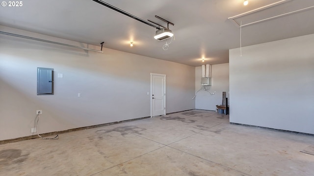 garage featuring electric panel and a garage door opener