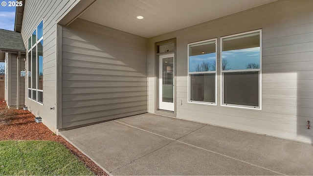 doorway to property featuring a patio