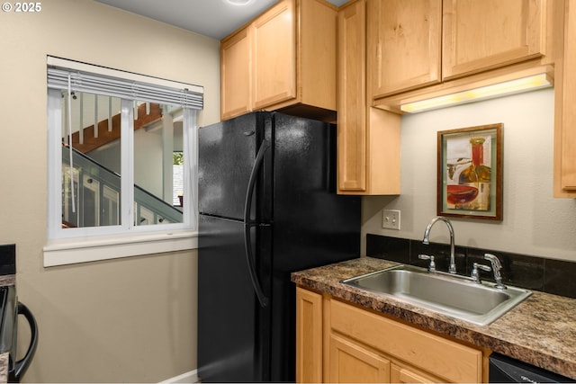 5050 S Landing Dr Unit 202, Portland, OR 97239 - kitchen with a sink, light brown cabinets, and black appliances