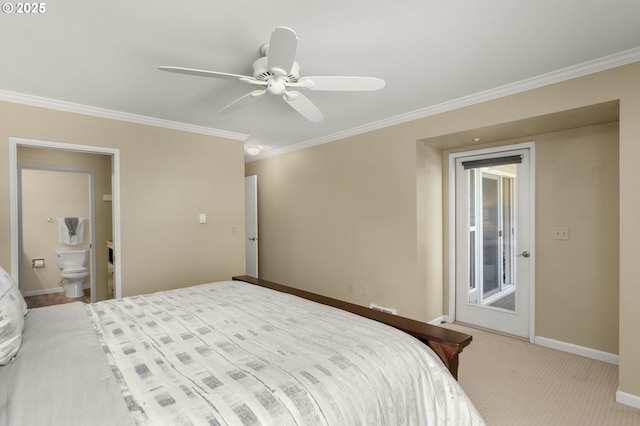 5050 S Landing Dr Unit 202, Portland, OR 97239 - bedroom featuring crown molding, baseboards, connected bathroom, a ceiling fan, and carpet