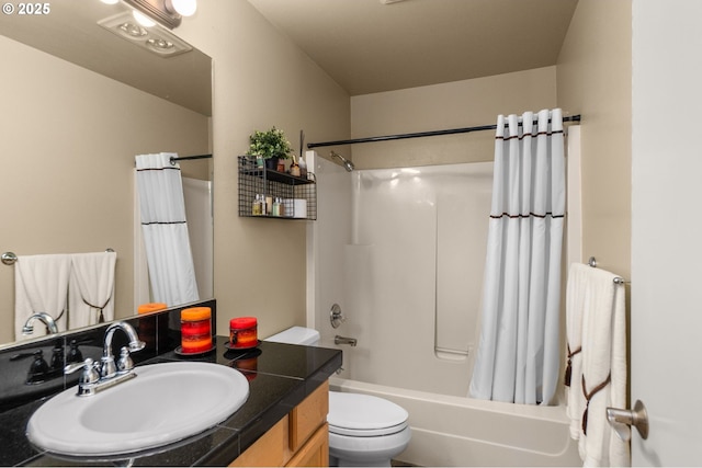 5050 S Landing Dr Unit 202, Portland, OR 97239 - bathroom featuring vanity, shower / bath combo, and toilet