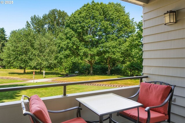 5050 S Landing Dr Unit 202, Portland, OR 97239 - balcony with view of wooded area