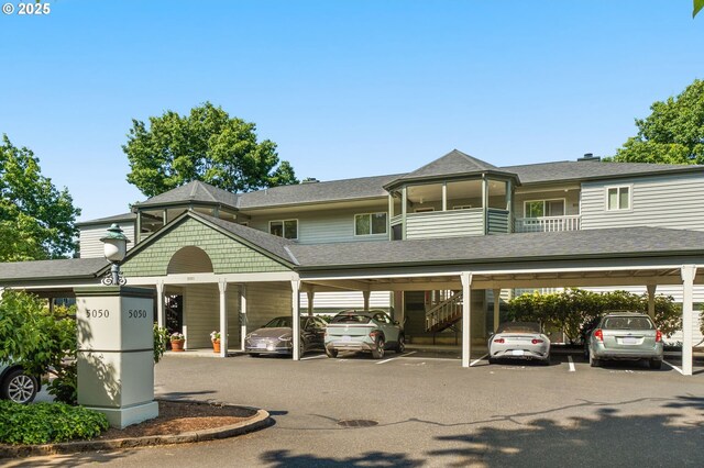 5050 S Landing Dr Unit 202, Portland, OR 97239 - view of property with covered parking
