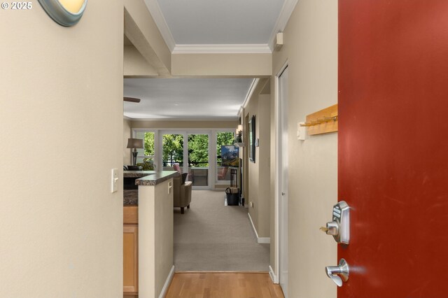 5050 S Landing Dr Unit 202, Portland, OR 97239 - hall featuring ornamental molding, light wood-style flooring, and baseboards
