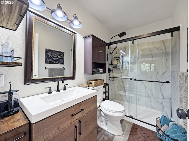 1546 Seacrest Ln, Brookings, OR 97415 - full bathroom featuring a textured wall, toilet, vanity, and a marble finish shower