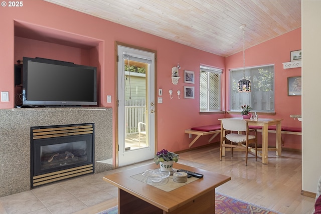 16952 SE Dunhill Loop, Damascus, OR 97089 - living area featuring wood ceiling, a fireplace, and wood finished floors