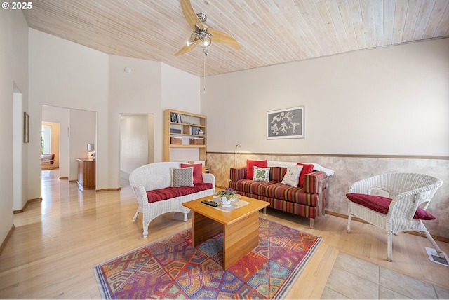16952 SE Dunhill Loop, Damascus, OR 97089 - living room featuring ceiling fan, wooden ceiling, wood finished floors, and a towering ceiling