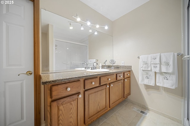 16952 SE Dunhill Loop, Damascus, OR 97089 - full bath with vanity, a shower stall, and tile patterned floors