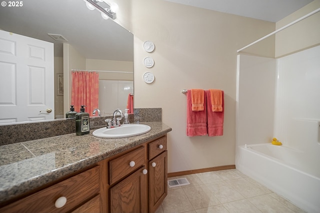 16952 SE Dunhill Loop, Damascus, OR 97089 - full bathroom featuring vanity, shower / tub combo with curtain, and tile patterned floors