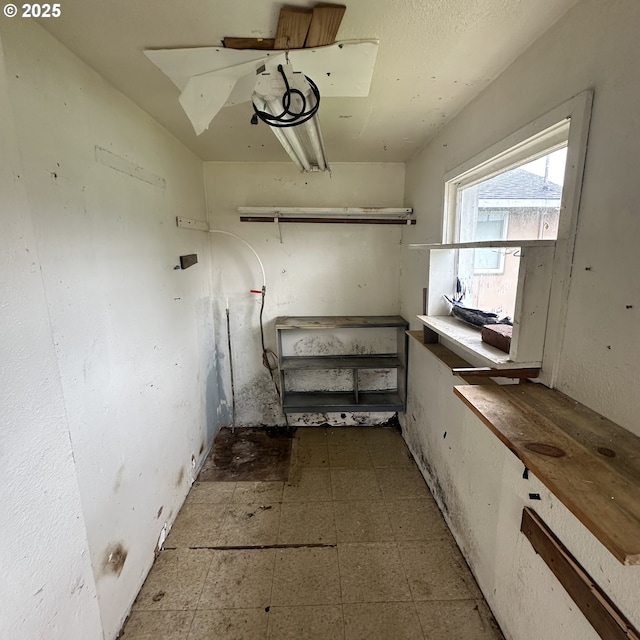 basement featuring tile patterned floors