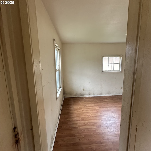 unfurnished room featuring wood finished floors