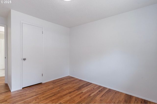 165 NE 167th Pl, Portland, OR 97230 - unfurnished room with light wood-type flooring and baseboards