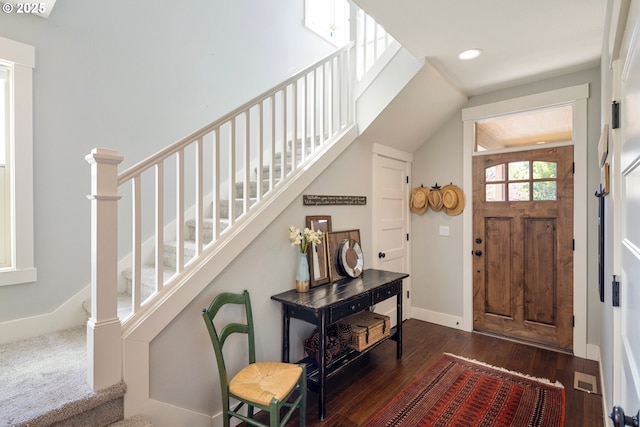 entryway with stairs, dark wood-style floors, recessed lighting, and baseboards