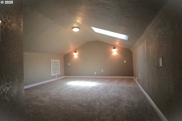 1974 N Laurelwood St, Canby, OR 97013 - bonus room featuring a skylight, carpet flooring, lofted ceiling, and a textured ceiling