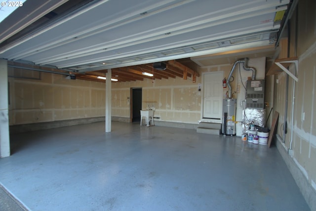 1974 N Laurelwood St, Canby, OR 97013 - garage with water heater and a garage door opener