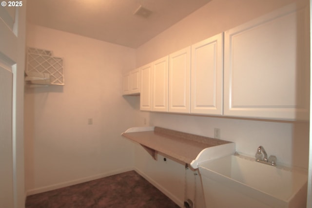 1974 N Laurelwood St, Canby, OR 97013 - laundry room featuring baseboards and a sink