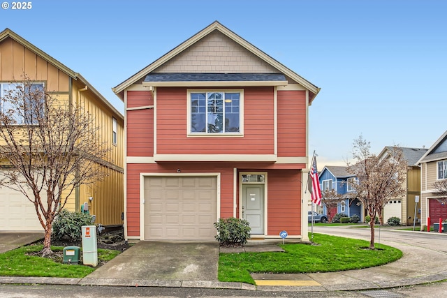 view of front of property featuring a garage