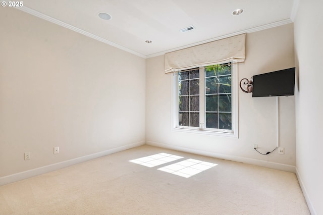 carpeted empty room featuring crown molding, visible vents, baseboards, and recessed lighting