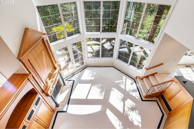unfurnished sunroom featuring french doors and visible vents